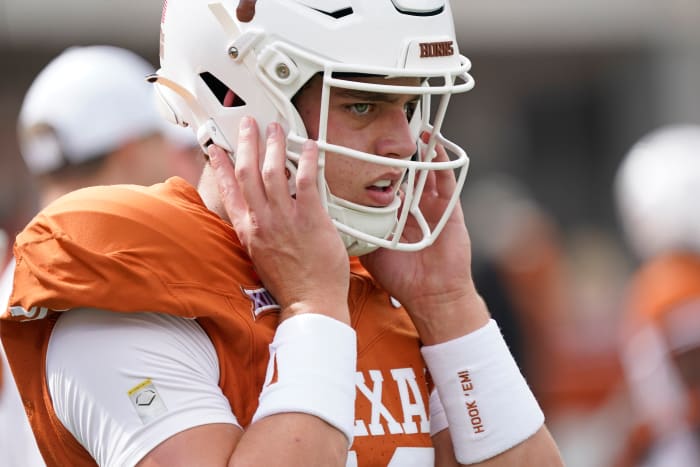 Texas Longhorns quarterback quarterback Arch Manning (16) warms up before a game against the Brigham Young Cougars at Darrell K Royal-Texas Memorial Stadium.